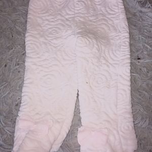 Pink fleece pants with feet enclosed